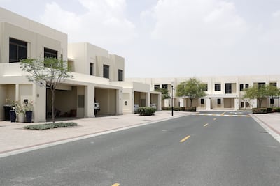 Noor Townhouses in Town Square is a family-friendly neighbourhood. Pawan Singh / The National