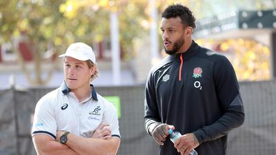 Michael Hooper talks to Courtney Lawes in Perth ahead of the start of the Australia v England series. AFP