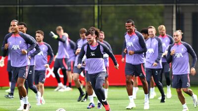 Liverpool's Andrew Robertson, centre, and teammates during a training session at the AXA Training Centre, Liverpool. PA