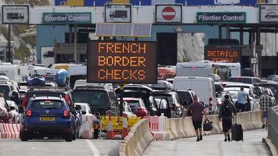 Staffing at French border control at the Port of Dover is 'woefully inadequate', causing holidaymakers to be stuck in long queues, the Kent port said. PA