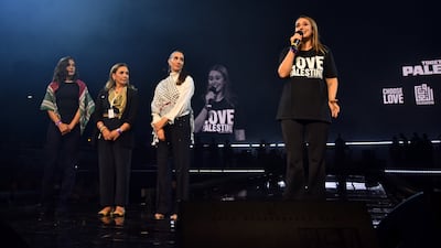Guest speaks during the concert. Getty Images