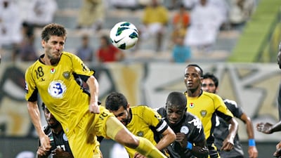 Al Wasl's Emiliano Alfaro heads the ball against Al Dhafra. Jeff Topping/The National