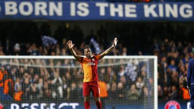 Galatasaray's Didier Drogba waves to fans after Tuesday's Champions League match. Andrew Winning / Reuters / March 18, 2014