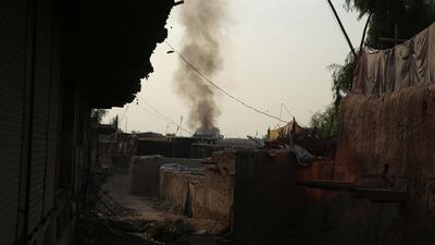Smoke billows from a prison after a militant attack in Jalalabad, Afghanistan. EPA