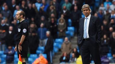 Manchester City manager Manuel Pellegrini observes his side during their Premier League win over Aston Villa on Saturday. Paul Ellis / AFP / April 25, 2015