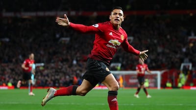 Manchester United's Alexis Sanchez celebrates completing his side's dramatic comeback. Getty Images