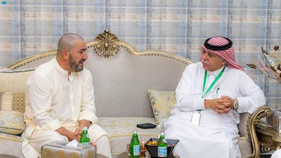 Adam Mohammed, 52, meets Dr Majid Al Qasabi, Saudi Arabia’s Acting Minister of Information, in Mina, after walking from Britain to the kingdom to perform Hajj. Photo: SPA