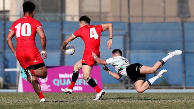 UAE and China in action during the Dialog Asia Rugby Sevens Series at Rugby Park in Dubai Sports City.