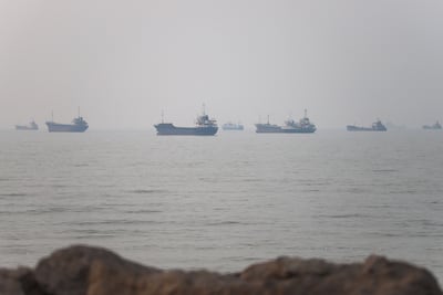 Vessels near the Iranian shoreline of the Strait of Hormuz. Reuters
