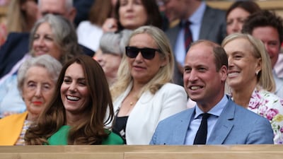 Britain's Kate Middleton, Duchess of Cambridge, and Prince William, Duke of Cambridge, watch the women's singles final at Wimbledon. AFP