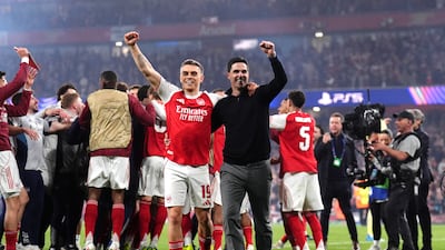 Arsenal's Leandro Trossard and manager Mikel Arteta celebrate victory. PA