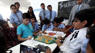 Arham Abidi, left, and Rohan Kapur participate in the free Scrabble workshop organised by UAE Scrabble Club in Dubai. Satish Kumar / The National