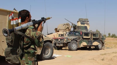 An Afghan soldier takes aim during an offensive against Taliban militants as they recaptured some of the districts in Nad-e-Ali area from Taliban militants, in Helmand, Afghanistan, 14 October 2017. Talks to end the war took place in Muscat. EPA/WATAN YAR