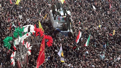 epa08107310 Iranian revolutionary guards surround the coffins of slain Iranian Revolutionary Guards Corps (IRGC) Lieutenant general and commander of the Quds Force Qasem Soleimani and of other victims as thousands of mourners gather to pay tribute for their funeral in Tehran, Iran, 06 January 2020. Soleimani was killed in a targeted US airstrike on 03 January 2020 in Baghdad, Iraq. EPA/ABEDIN TAHERKENAREH