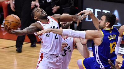 Toronto Raptors forward Kawhi Leonard gets a shot blocked by Golden State Warriors centre Andrew Bogut. EPA