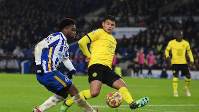 Tariq Lamptey of Brighton & Hove Albion crosses the ball under pressure from Thiago Silva of Chelsea during the Premier League match at American Express Community Stadium on January 18, 2022 in Brighton. The match finished 1-1. Getty Images