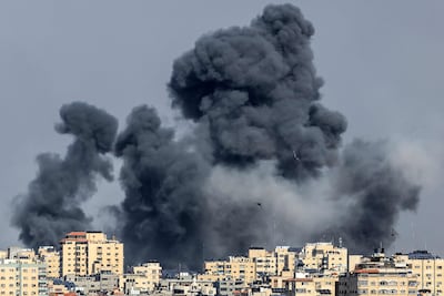 Smoke rises over Gaza city on October 7, 2023 after Israeli air strikes, a quick retaliation for the Hamas attacks earlier that day. AFP