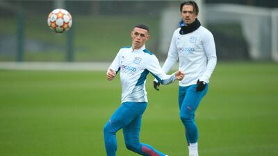 Phil Foden and Jack Grealish take part in a training session. AFP