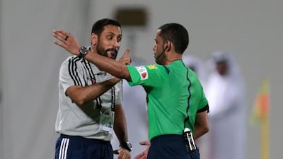 Sami Al Jaber argues with a referee while in charge of Al Wahda during an Arabian Gulf League match in April. Christopher Pike / The National / April 12, 2015