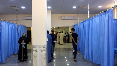 A temporary emergency unit stands next to the wrecked building of Ramadi's general hospital. Sofia Barbarani / The National