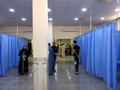 A temporary emergency unit stands next to the wrecked building of Ramadi's general hospital. Sofia Barbarani / The National