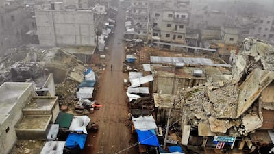 An aerial view shows the aftermath of an air strike by pro-regime forces on the rebel-held town of Ariha in the northern countryside of Syria's Idlib province. AFP