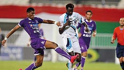 Andre Senghor, right, showed Al Ain what they were missing with a brace last night.