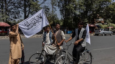 People mark the dawn of a new era in Kabul. Stefanie Glinski / The National