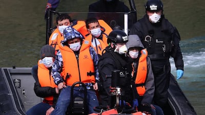 A group of people thought to be migrants are brought in to Dover, Kent, on the south-east coast of England. Getty