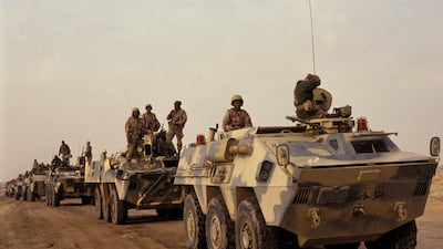 An armoured convoy of Saudi troops taking part in Operation Desert Storm, on Saudi Arabia's border with Kuwait in January 1991. Getty Images