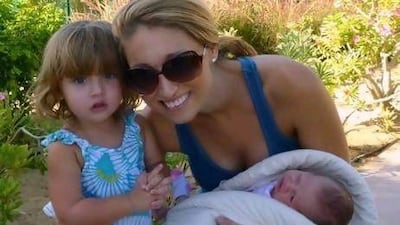 Stacy Peters and her daughters Caroline and Lily. Mrs Peters was recently awarded custody of her older daughter by a Dubai court.