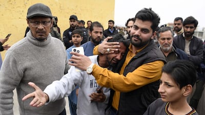A distraught relative of a victim of a suicide bomb blast that targeted a Shiite mosque in Pakistan's capital Islamabad on February 6. EPA