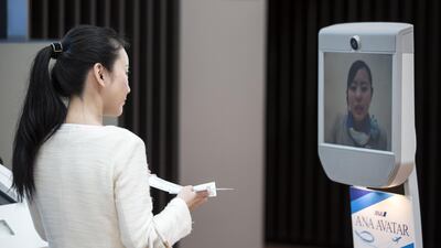 An ANA Holdings Inc. employee is seen on a Beam Pro telepresence robot manufactured by Suitable Technologies. Major technology companies are under increasing scruting. Tomohiro Ohsumi/Bloomberg