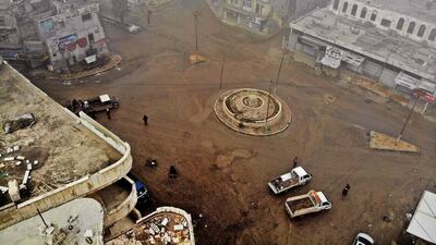 An aerial view shows nearly empty streets in the rebel-held town of Ariha in the northern countryside of Syria's Idlib province following an air strike by pro-regime forces. AFP