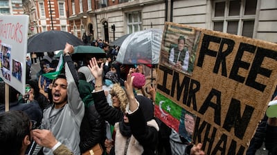 A crowd protests against the arrest of former Pakistan prime minister Imran Khan outside Avenfield House in London. Bloomberg