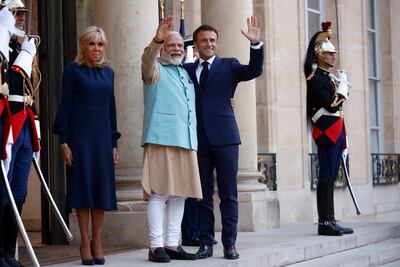 Brigitte Macron, left, joins the two leaders before France and India agreed to use the Unified Payments Interface. EPA