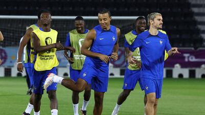 France's Antoine Griezmann, Jules Kounde and Eduardo Camavinga during training. Reuters