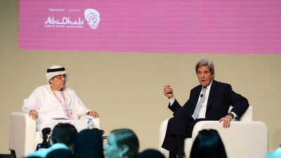 Zaki Nusseibeh, Minister of State, and John Kerry, former US secretary of state, at the Abu Dhabi International Book Fair. Pawan Singh / The National