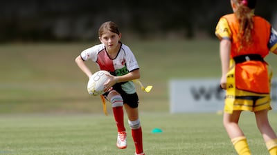 Young rugby players in action.
