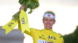 overall winner Slovenian cyclist Tadej Pogacar of UAE Team Emirates XRG celebrates on the podium after the 21st and final stage of the Tour de France, 88. 7 km route starting and ending in Paris, France, 26 July 2026. EPA / PAPON BERNARD / POOL
