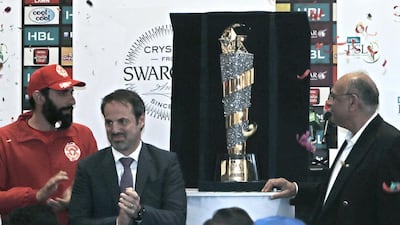 Misbah-ul-Haq, left, of Islamabad United is one of the team captains on hand on February 6 in Dubai with Pakistan Super League chairman Najam Sethi, far right, at the trophy unveiling ceremony ahead of this year's tournament. Jeffrey E Biteng / The National