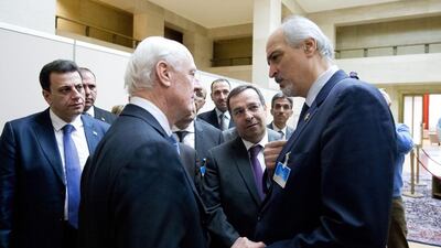 Syrian ambassador to UN and head of the government delegation Bashar al-Jaafari (R) being greeted by UN envoy for Syria Staffan de Mistura (L) upon his arrival at the opening of Syrian peace talks in Geneva. AFP Photo