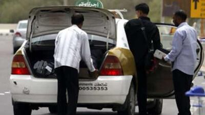 Taxis are permitted only to drop people off at the airport, not pick them up.