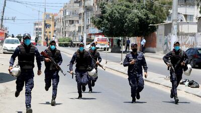 Security forces loyal to Hamas take part in a simulation exercise for preventing the spread of the coronavirus. Reuters