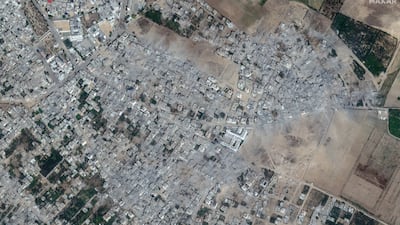 Satellite view shows the Palestinian city of Beit Hanoun in May and October 2023. Reuters
