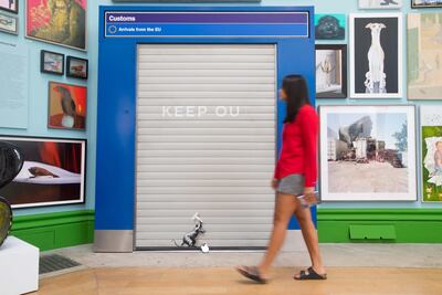 Banksy is among the artists to create work about the debate with his piece ‘Keep Ou’. David Parry / Royal Academy of Arts