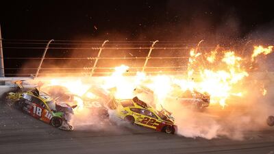 A fire breaks out during the crash at the at Daytona International Speedway. AFP