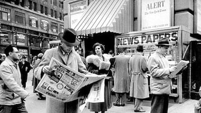 During the New York newspapers' strike of 1953, citizens flocked to a Times Square stall that sold out-of-town papers. Ralph Morse / Time Life Pictures / Getty Images
