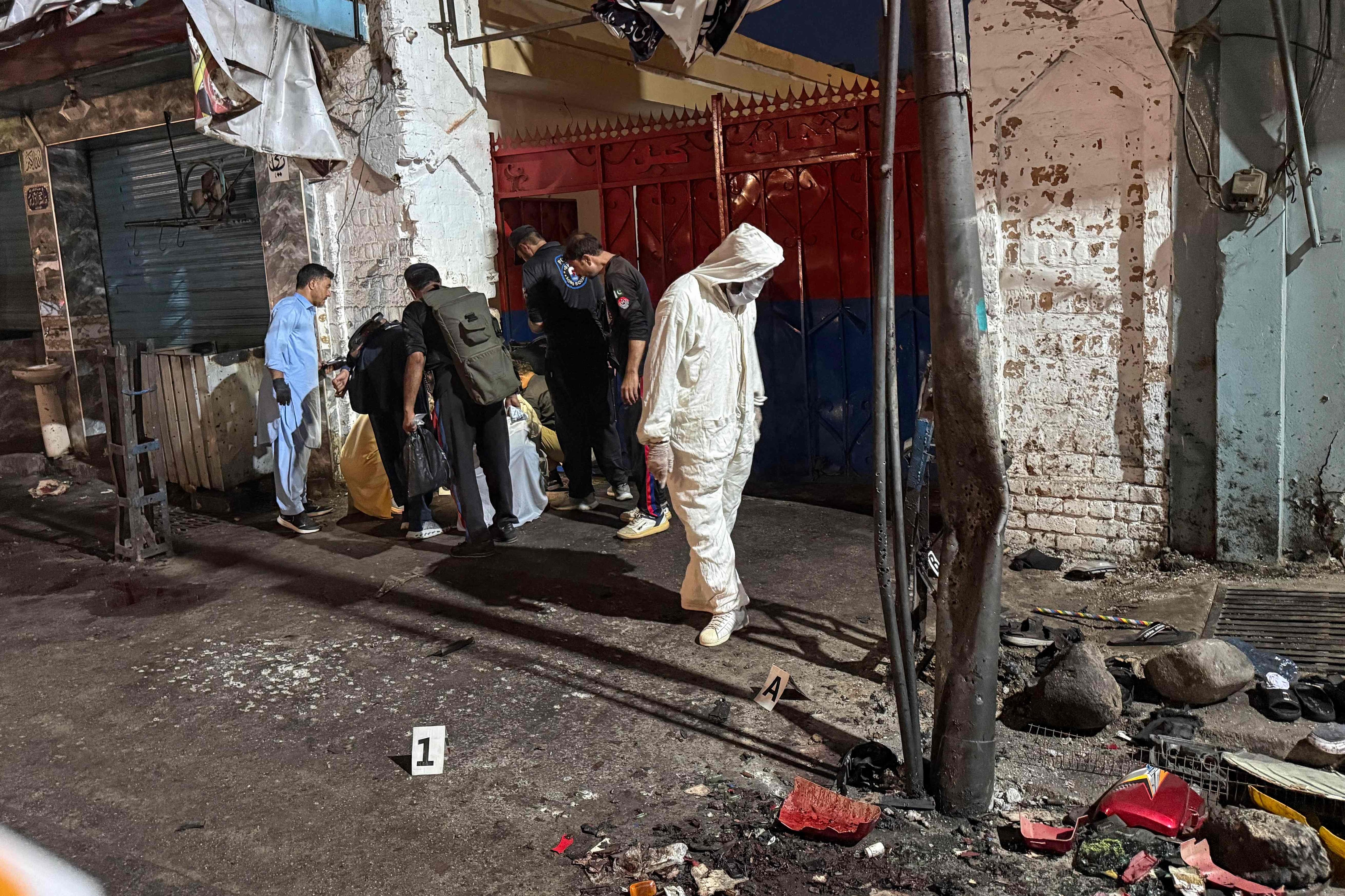 Image linked from the original feed: Suspected suicide bombing kills at least 14 in Pakistan