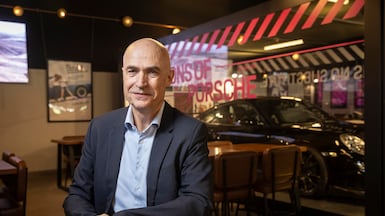 Manfred Braunl, chief executive of Porsche Middle East and Africa, says an electric version of its two-door sports car in the 718 segment will be available in the region 'soon'. Antonie Robertson / The National